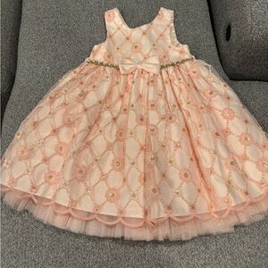 Charming Peach Kids Dress with Floral Accents
